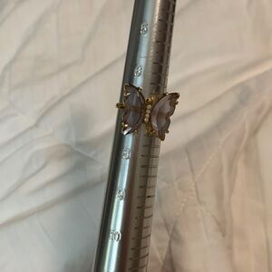 Gold tone purple butterfly ring